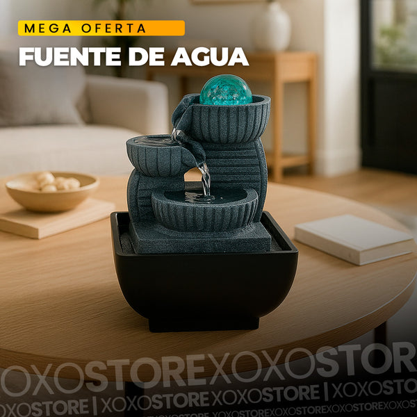 Fuente de agua iluminada