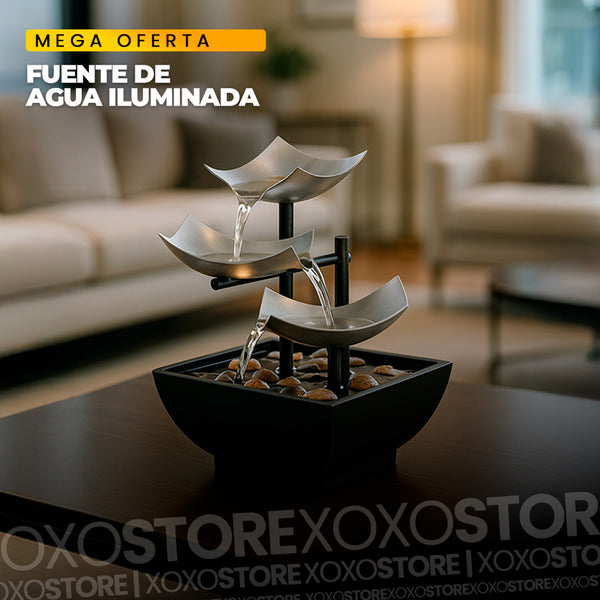 Fuente de agua iluminada